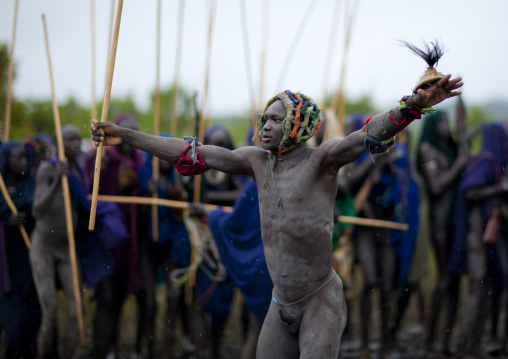 Suri tribe warriors fighting during a donga stick ritual, Omo valley, Tulgit, Ethiopia