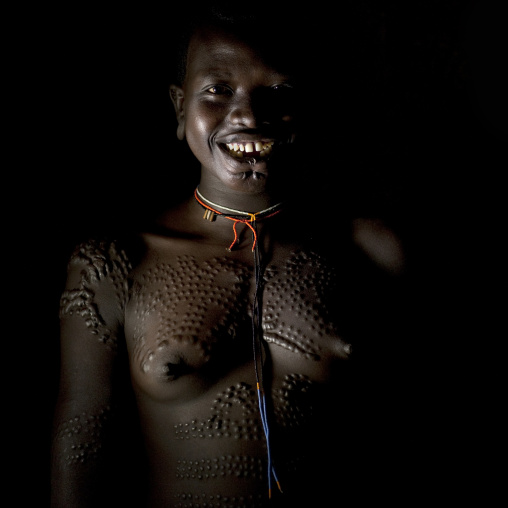 Surma Woman With Decorative Body Scarifications, Kibbish Village, Omo Valley, Ethiopia