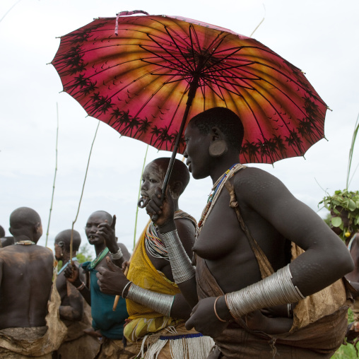 Suri Woman With A Chinese Umbrella, Kibbish Village, Omo Valley, Ethiopia