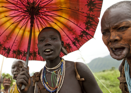 Suri Woman With A Chinese Umbrella, Kibbish Village, Omo Valley, Ethiopia