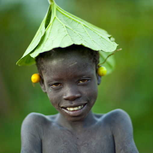 Surma Boy Wearing Flower Ornaments, Turgit Village, Omo Valley, Ethiopia