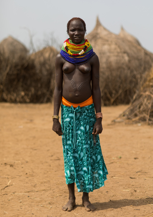 Nyangatom tribe woman with a huge necklace, Omo Valley, Kangate, Ethiopia