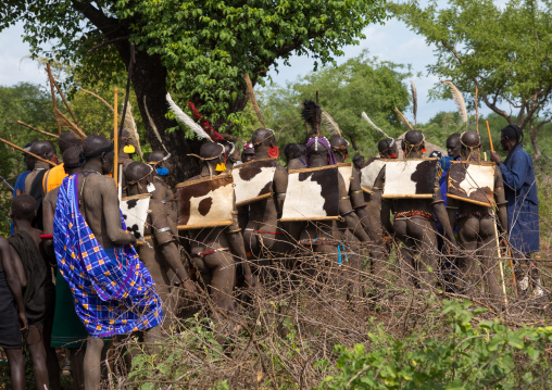 Bodi tribe fat men during Kael ceremony, Omo valley, Hana Mursi, Ethiopia