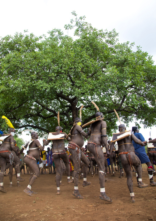 Bodi tribe fat men during Kael ceremony, Omo valley, Hana Mursi, Ethiopia