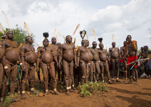 Bodi tribe fat men during Kael ceremony, Omo valley, Hana Mursi, Ethiopia