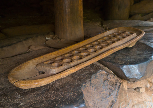 Wood board game in a house, Omo valley, Konso, Ethiopia