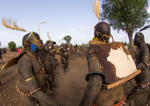 Bodi tribe fat men during Kael ceremony, Omo valley, Hana Mursi, Ethiopia