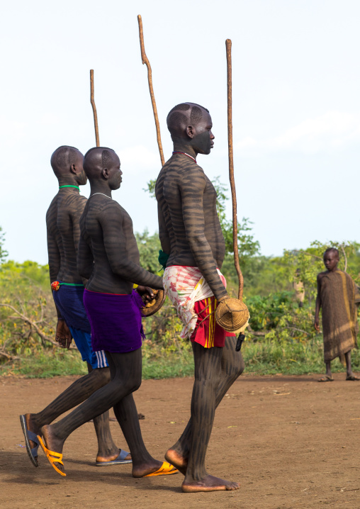 Young men during the fat men ceremony in Bodi tribe, Omo valley, Hana Mursi, Ethiopia