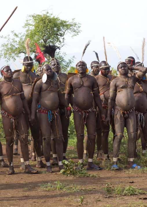 Bodi tribe fat men during Kael ceremony, Omo valley, Hana Mursi, Ethiopia