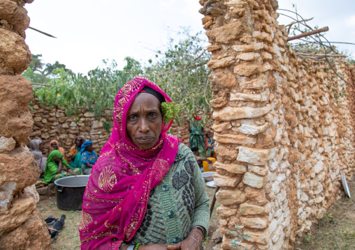 Harari woman portrait wearing basil on a ear, Harari Region, Harar, Ethiopia