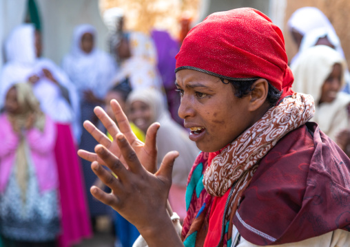 Harari woman goes into a trance during a muslim ceremony, Harari Region, Harar, Ethiopia