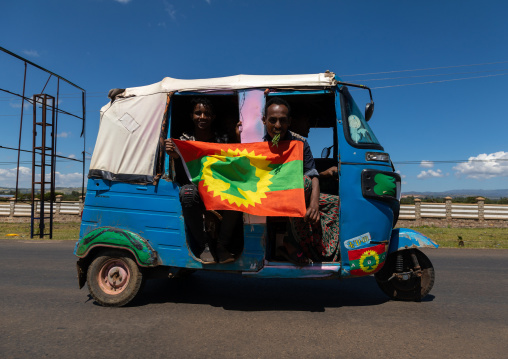 Tuk tuk with a oromo liberation front party flag, Oromia, Waliso, Ethiopia