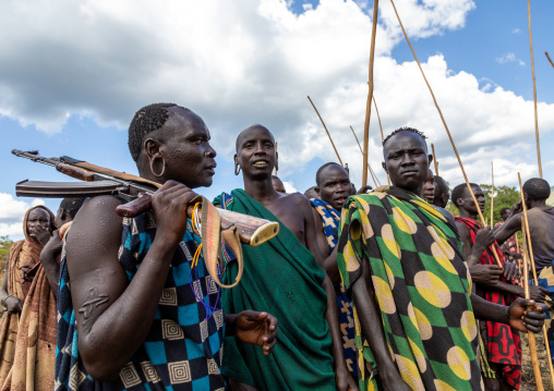 Group of suri tribe warriors during a donga stick fighting ritual, Omo valley, Kibish, Ethiopia