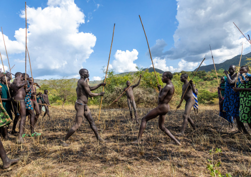 Suri tribe warriors fighting during a donga stick ritual, Omo valley, Kibish, Ethiopia