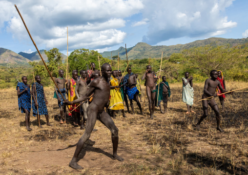 Suri tribe warriors fighting during a donga stick ritual, Omo valley, Kibish, Ethiopia