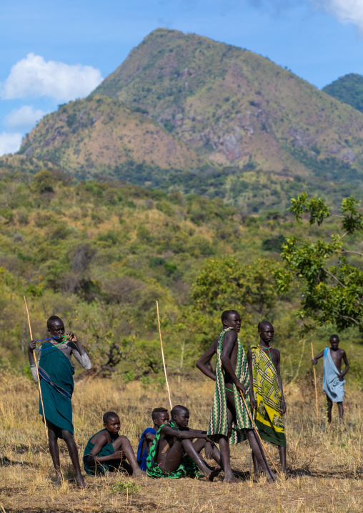 Suri tribe teenage boys during a donga stick fighting ritual, Omo valley, Kibish, Ethiopia