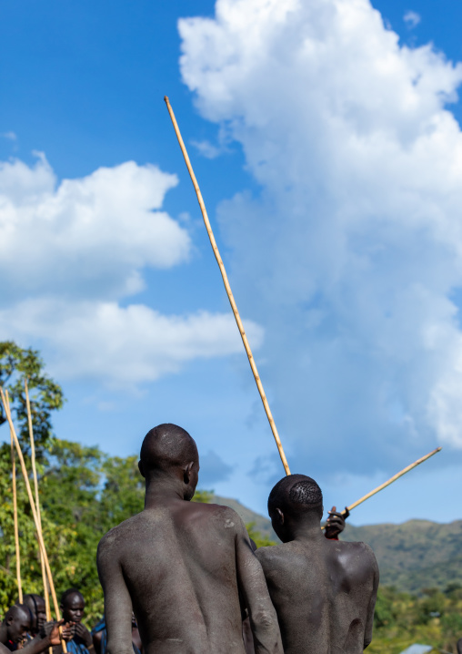 Suri tribe warriors during a donga stick fighting ritual, Omo valley, Kibish, Ethiopia