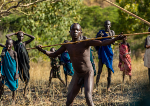 Suri tribe warriors during a donga stick fighting ritual, Omo valley, Kibish, Ethiopia