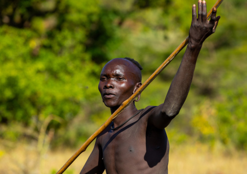 Suri tribe warrior during a donga stick fighting ritual, Omo valley, Kibish, Ethiopia