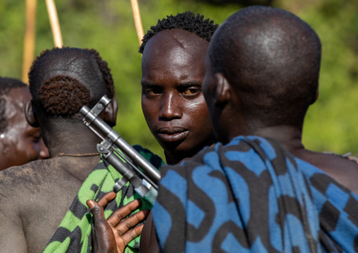 Suri tribe warriors during a donga stick fighting ritual, Omo valley, Kibish, Ethiopia