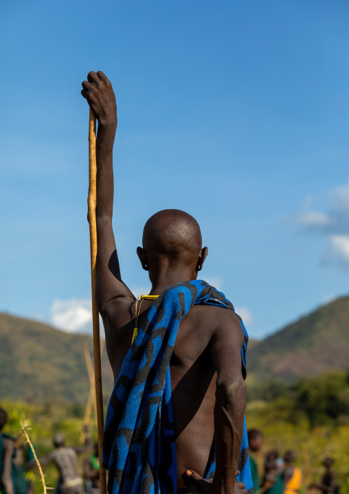 Suri tribe warrior during a donga stick fighting ritual, Omo valley, Kibish, Ethiopia