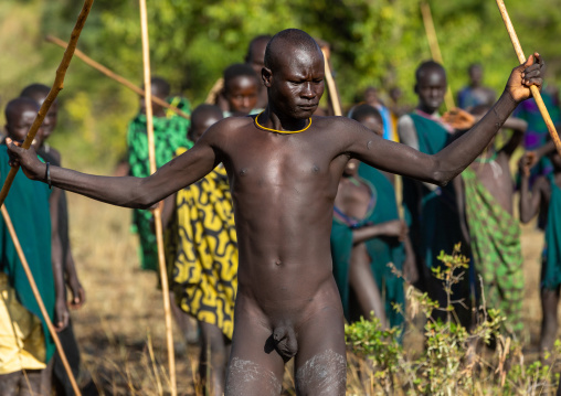 Suri tribe warrior fighting during a donga stick ritual, Omo valley, Kibish, Ethiopia