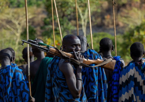 Suri tribe warriors during a donga stick fighting ritual, Omo valley, Kibish, Ethiopia