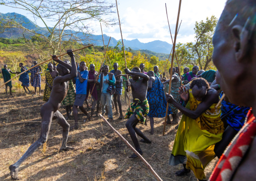 Suri tribe warriors fighting during a donga stick ritual, Omo valley, Kibish, Ethiopia