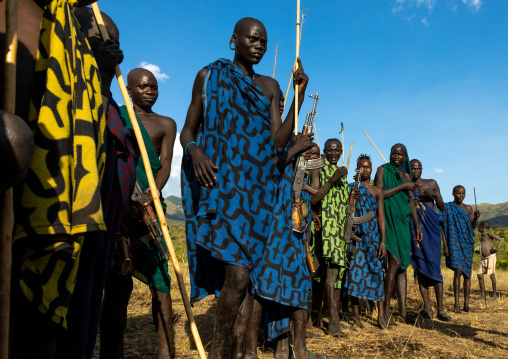 Group of suri tribe warriors during a donga stick fighting ritual, Omo valley, Kibish, Ethiopia