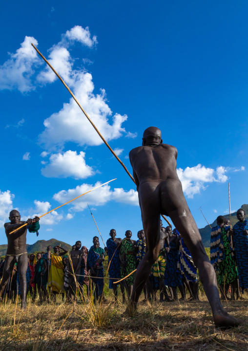 Suri tribe warriors fighting during a donga stick ritual, Omo valley, Kibish, Ethiopia