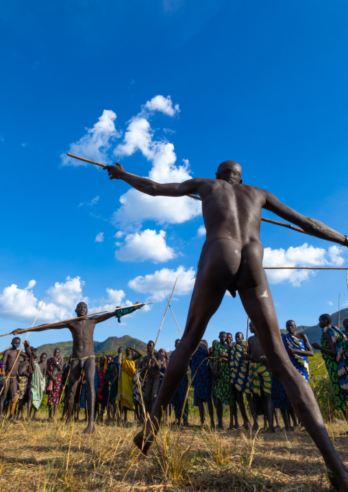 Suri tribe warriors fighting during a donga stick ritual, Omo valley, Kibish, Ethiopia