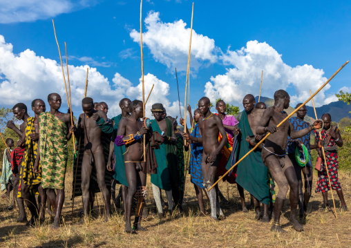 Group of suri tribe warriors during a donga stick fighting ritual, Omo valley, Kibish, Ethiopia