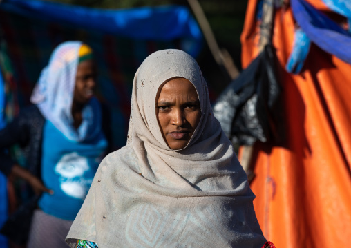 Veiled oromo woman in a market, Amhara region, Senbete, Ethiopia