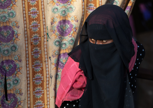 Oromo woman wearing a burqa in the market, Amhara region, Senbete, Ethiopia