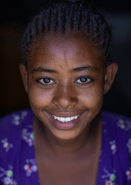 Portrait of a smiling raya tribe girl, Afar Region, Chifra, Ethiopia