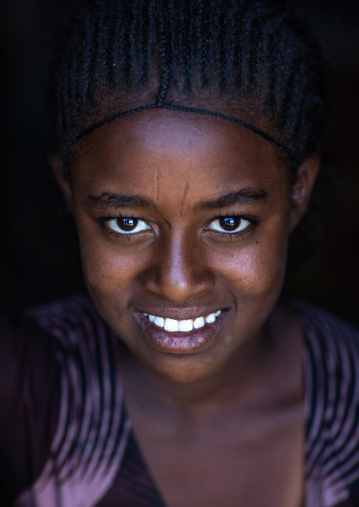 Portrait of a smiling raya tribe girl, Afar Region, Chifra, Ethiopia