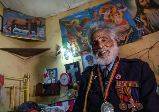 Veteran from the italo-ethiopian war in army uniform inside his home, Addis Abeba region, Addis Ababa, Ethiopia