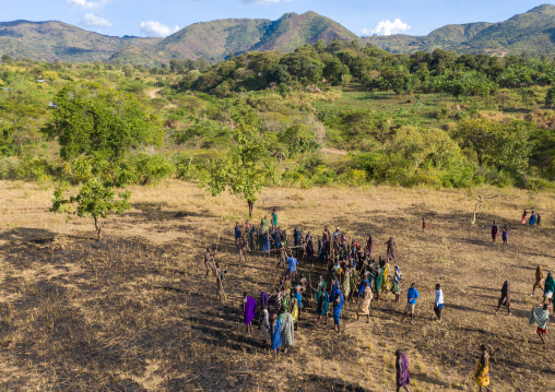 Aerial view of suri tribe warriors fighting during a donga stick ritual, Omo valley, Kibish, Ethiopia