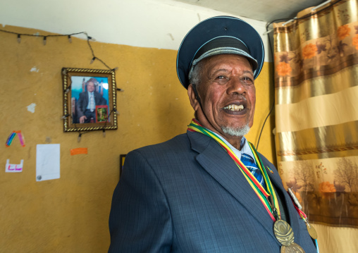 Ethiopian veteran from the italo-ethiopian war in army uniform in his home, Addis Ababa Region, Addis Ababa, Ethiopia