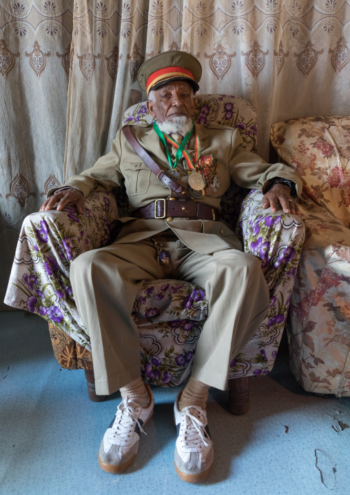 Ethiopian veteran from the italo-ethiopian war in army uniform in his home, Addis Ababa Region, Addis Ababa, Ethiopia