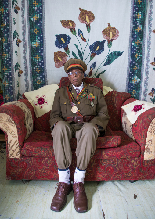 Ethiopian veteran from the italo-ethiopian war in army uniform in his home, Addis Ababa Region, Addis Ababa, Ethiopia