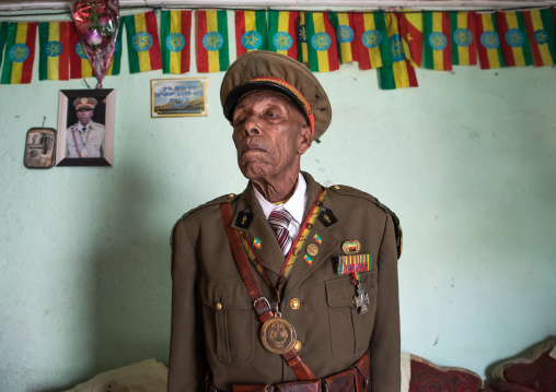 Ethiopian veteran from the italo-ethiopian war in army uniform in his home, Addis Ababa Region, Addis Ababa, Ethiopia