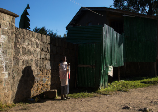 Ethiopian orthodox woman praying in Entoto orthodox Maryam Church, Addis Ababa Region, Addis Ababa, Ethiopia