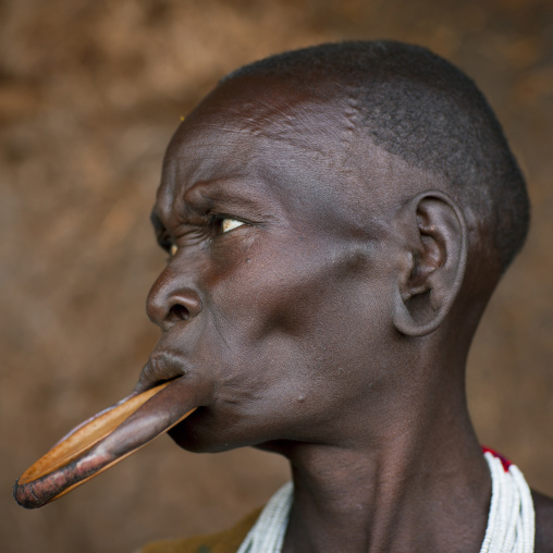 Suri tribe woman with a lip disc, Kibish, Omo valley, Ethiopia