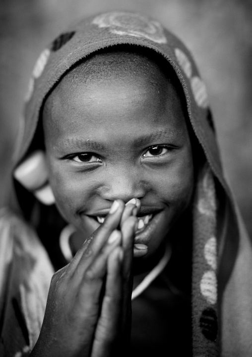 Suri tribe girl with enlarged earlobe, Kibish, Omo valley, Ethiopia