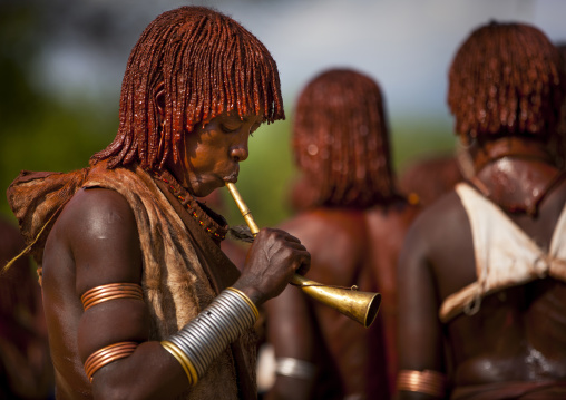 Hamar Tribe Woman Playing Music At Bull Jumping Ceremony, Turmi, Omo Valley, Ethiopia