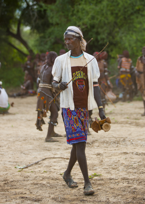 Hamar Tribe Man Holding Headrests At Bull Jumping Ceremony, Turmi, Omo Valley, Ethiopia