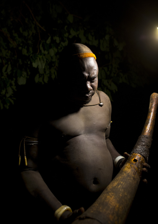 Bodi Tribe Man With An Elephant Tusk During The Kael Ceremony, Hana Mursi, Omo Valley, Ethiopia