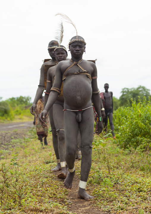 Bodi Tribe Fat Men Going To The Kael Ceremony, Hana Mursi, Omo Valley, Ethiopia