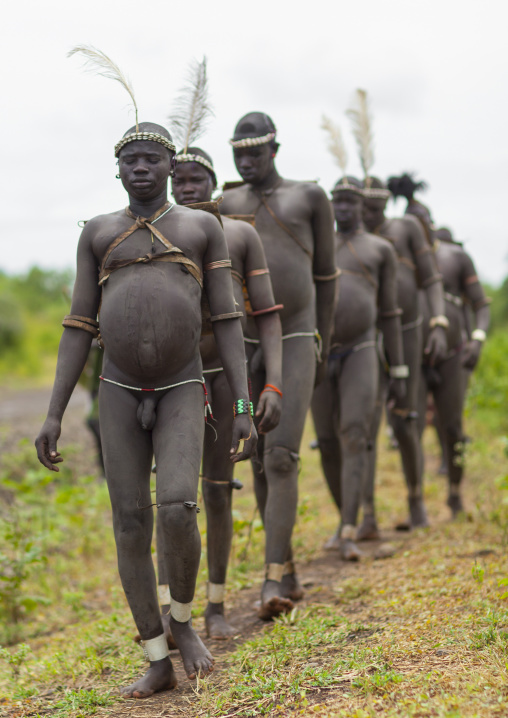 Bodi Tribe Fat Men Going To The Kael Ceremony, Hana Mursi, Omo Valley, Ethiopia